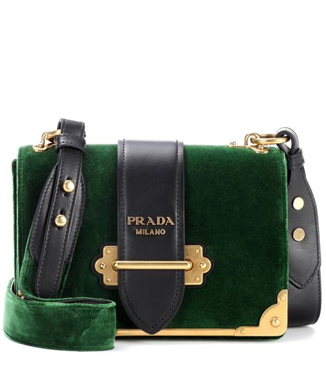 green prada bag.